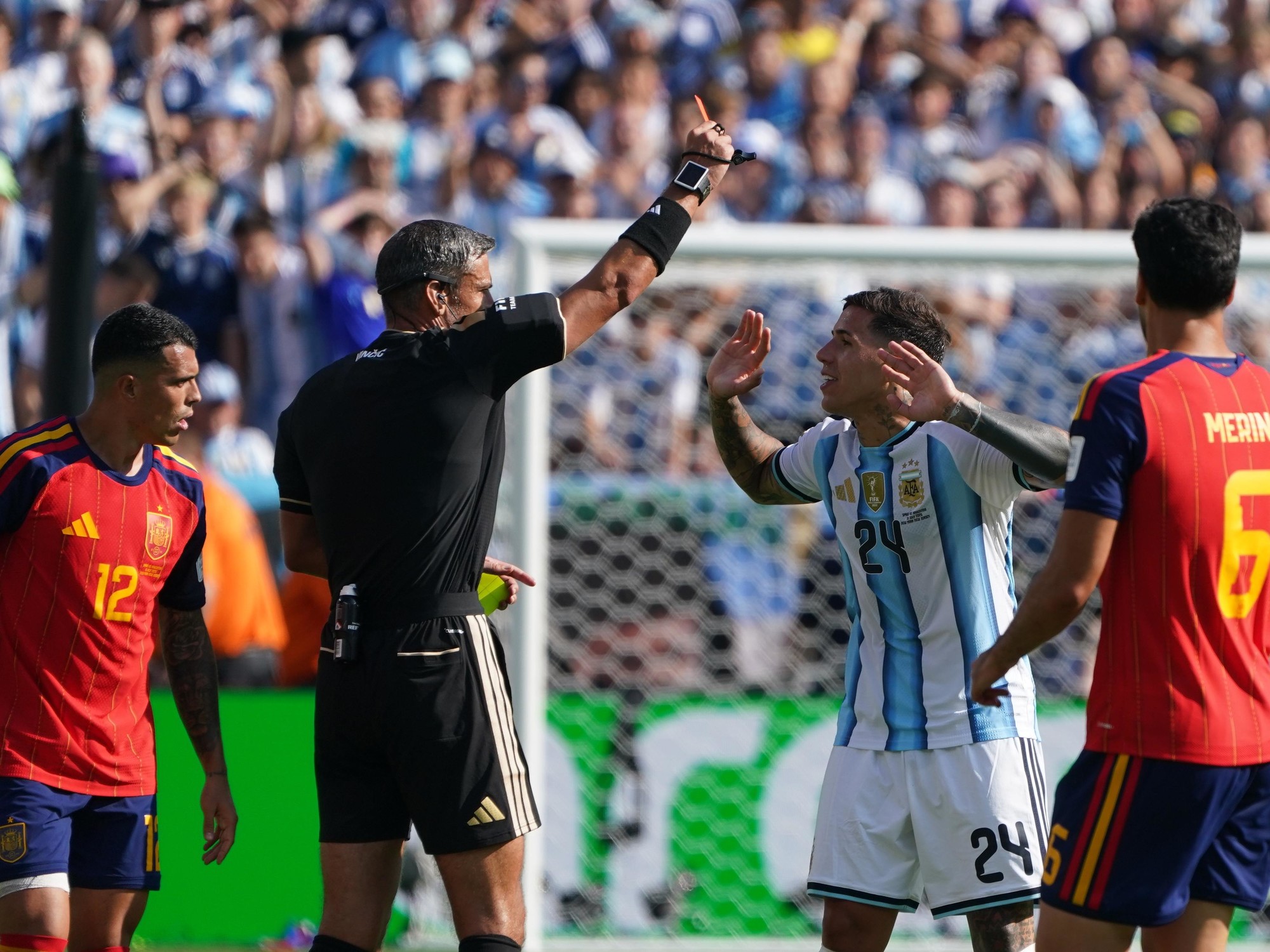 Referee Slavko Vinčić shows a card during the 2026 World Cup final between Spain and Argentina