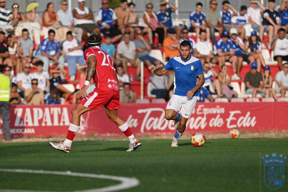 Xerez CD and Racing Portuense players during the friendly at the José del Cuvillo