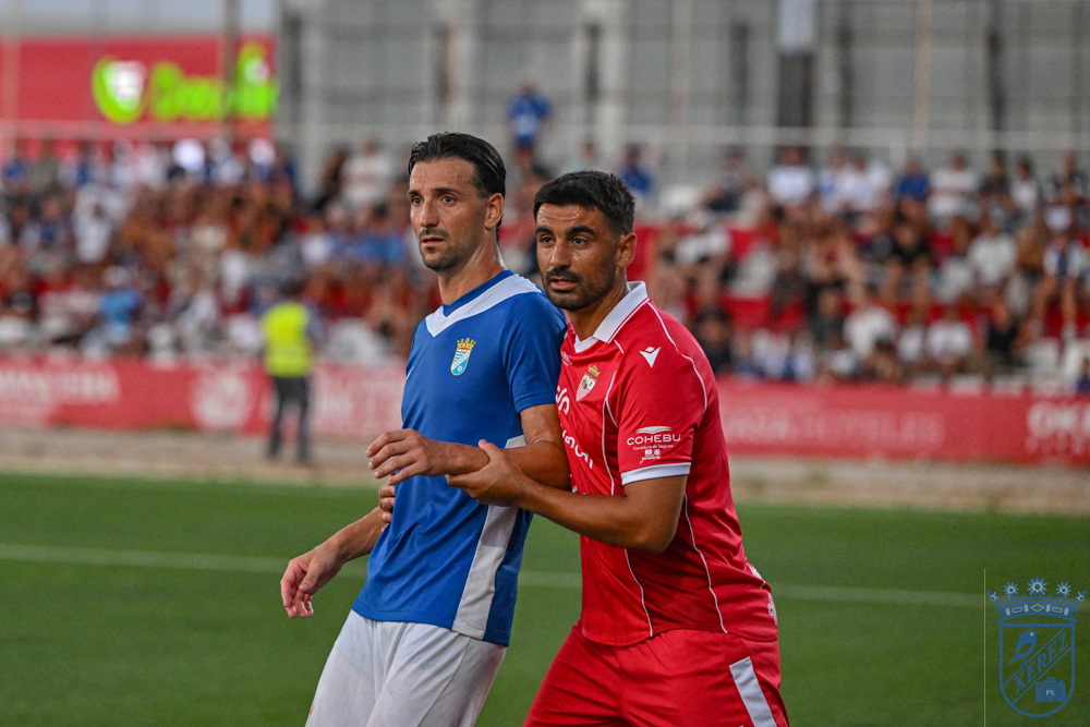 Close marking between a Xerez CD player and a Racing Portuense player